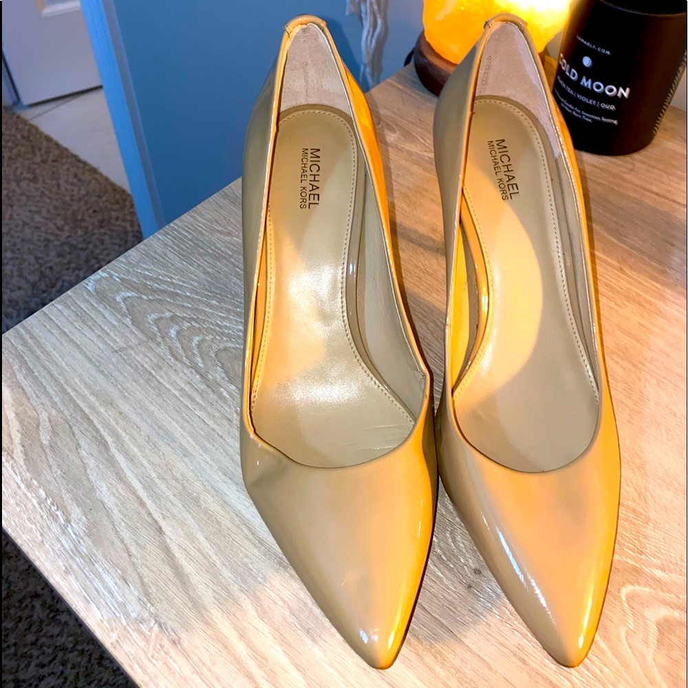 Never worn Michael Kors nude heels. Size 9.5
